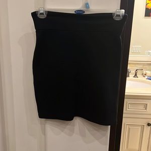 black mini skirt with bronze zipper in back